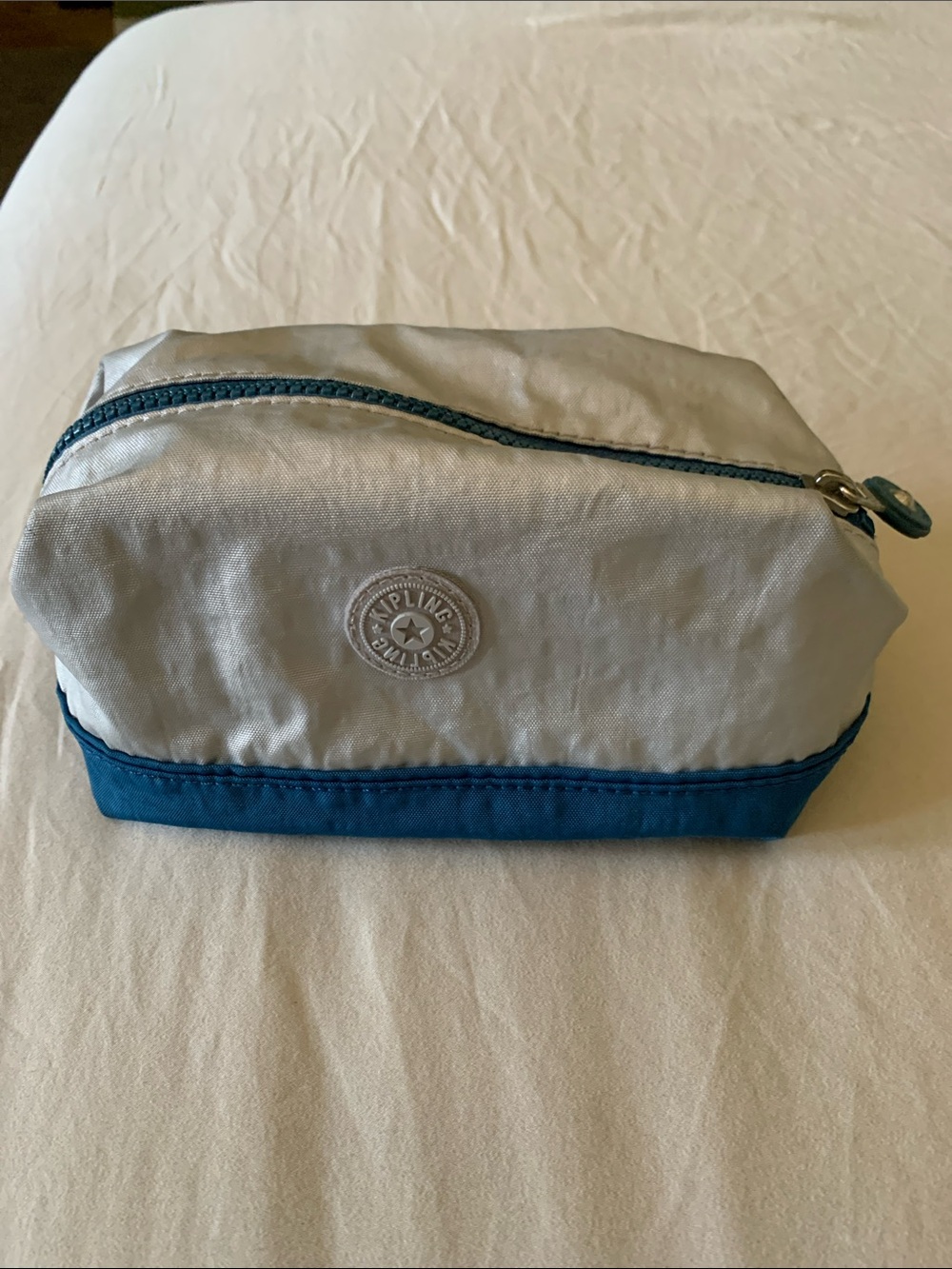 Kipling Two-Tone Travel Pouch — Silver & Teal Blue